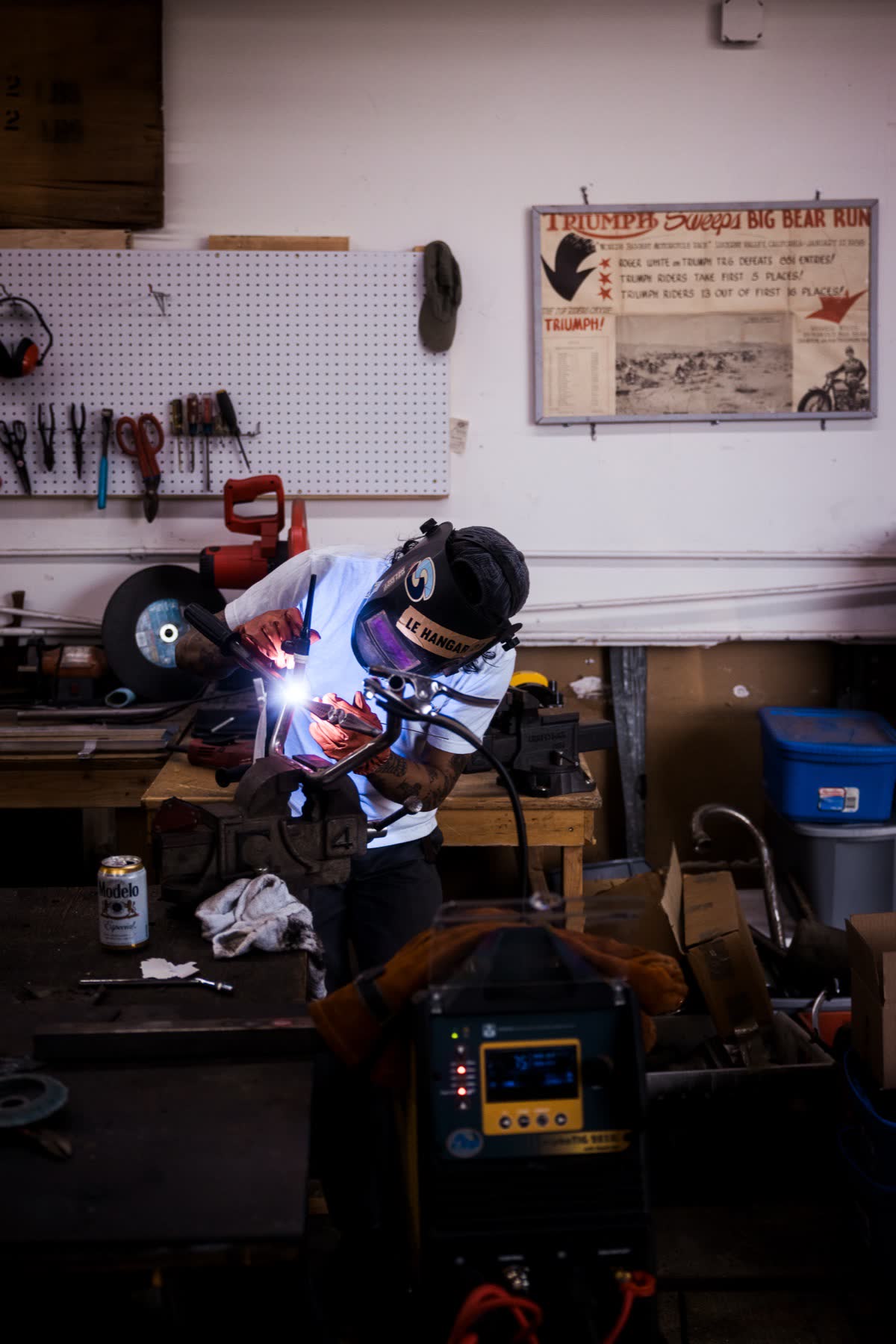 Welding bench at Le Hangar 23 with Triumph frame components